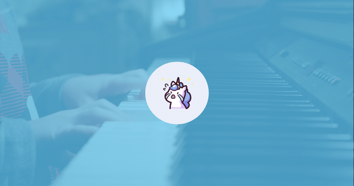 A child playing a piano on a blue background in their parents' specially created nook for better practice at home.